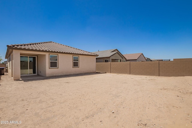 3036 E Riding Boot Way, San Tan Valley, AZ 85140 - back of house with a tile roof, a fenced backyard, and stucco siding