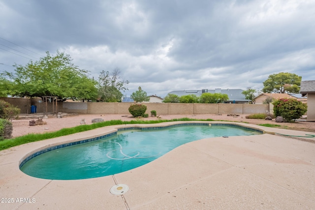 view of pool featuring a fenced backyard and a patio area