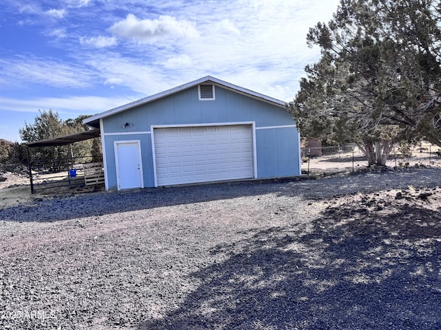 detached garage with fence