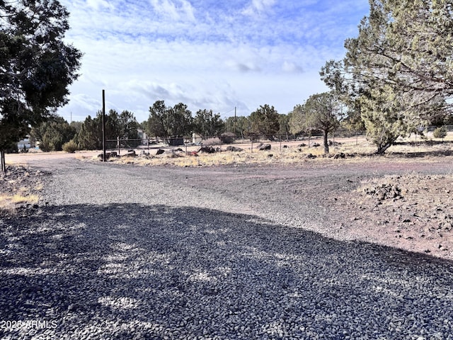 exterior space with a rural view