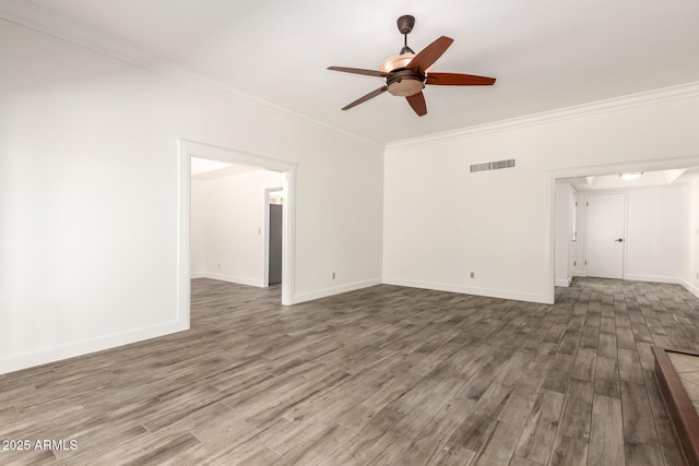38 E Calavar Rd, Phoenix, AZ 85022 - spare room with ceiling fan, ornamental molding, and wood finished floors
