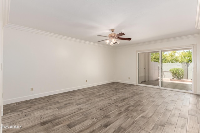 38 E Calavar Rd, Phoenix, AZ 85022 - spare room with wood finished floors, ceiling fan, and ornamental molding