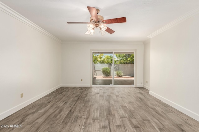38 E Calavar Rd, Phoenix, AZ 85022 - unfurnished room featuring ornamental molding, ceiling fan, and wood finished floors