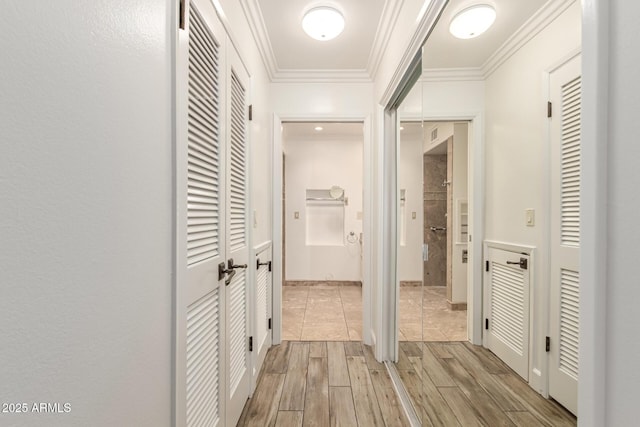38 E Calavar Rd, Phoenix, AZ 85022 - corridor with light wood finished floors and ornamental molding