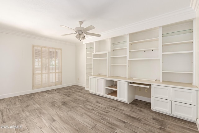 38 E Calavar Rd, Phoenix, AZ 85022 - unfurnished office featuring a ceiling fan, crown molding, wood finished floors, and built in study area