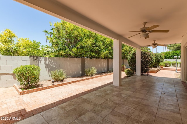 38 E Calavar Rd, Phoenix, AZ 85022 - fenced backyard with a patio area and a ceiling fan