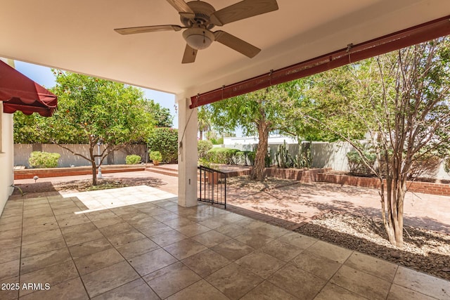 38 E Calavar Rd, Phoenix, AZ 85022 - fenced backyard featuring a patio area and a ceiling fan