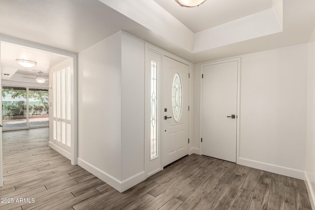 38 E Calavar Rd, Phoenix, AZ 85022 - foyer entrance featuring wood finished floors and a raised ceiling