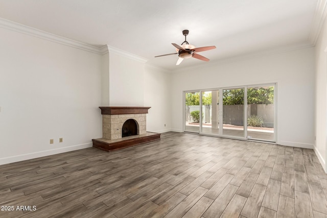 38 E Calavar Rd, Phoenix, AZ 85022 - unfurnished living room with wood finished floors, a ceiling fan, a fireplace, and ornamental molding