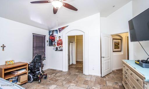 bedroom featuring ceiling fan