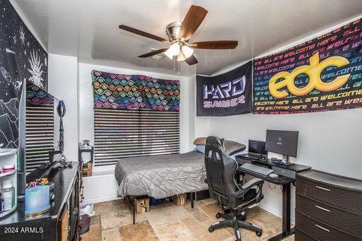 bedroom featuring ceiling fan