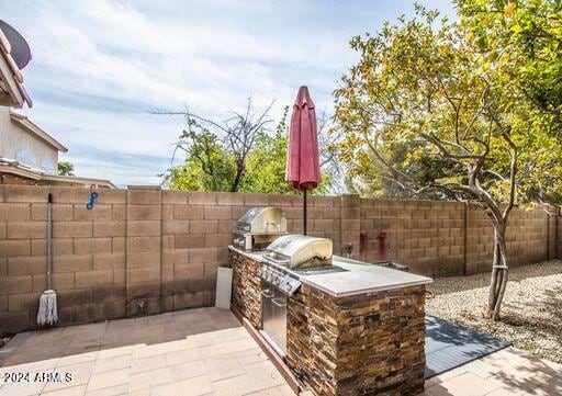 view of patio featuring area for grilling