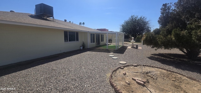 13816 N 103rd Ave, Sun City, AZ 85351 - view of yard featuring central AC unit, a patio area, and fence
