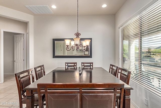 27105 W Marco Polo Rd, Buckeye, AZ 85396 - dining area with light tile patterned floors, a chandelier, and recessed lighting