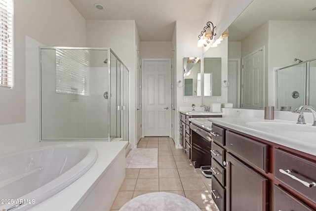 27105 W Marco Polo Rd, Buckeye, AZ 85396 - full bath with a shower stall, tile patterned floors, a bath, and vanity