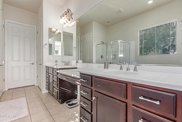 27105 W Marco Polo Rd, Buckeye, AZ 85396 - full bathroom featuring tile patterned flooring, a shower stall, and vanity
