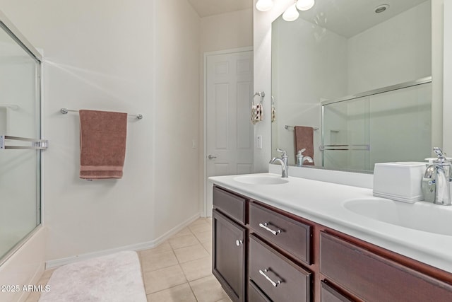 27105 W Marco Polo Rd, Buckeye, AZ 85396 - full bath with double vanity, tile patterned flooring, and baseboards