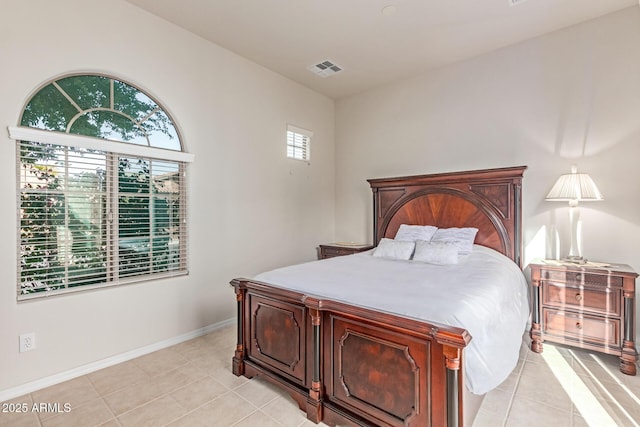 27105 W Marco Polo Rd, Buckeye, AZ 85396 - bedroom with light tile patterned floors and baseboards