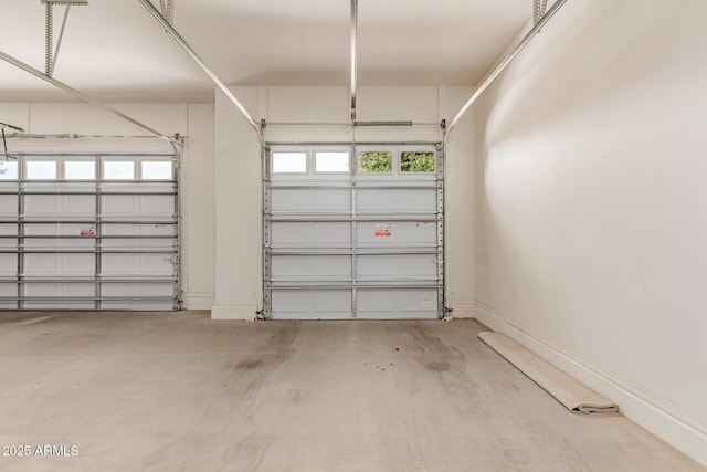 27105 W Marco Polo Rd, Buckeye, AZ 85396 - garage featuring baseboards