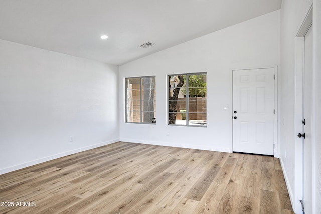 1236 S Boulder St Unit C, Gilbert, AZ 85296 - spare room featuring vaulted ceiling, light wood-style flooring, and recessed lighting