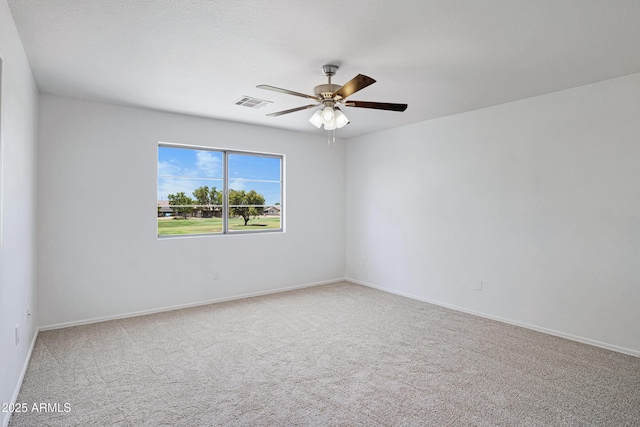 1236 S Boulder St Unit C, Gilbert, AZ 85296 - carpeted spare room featuring a ceiling fan and baseboards