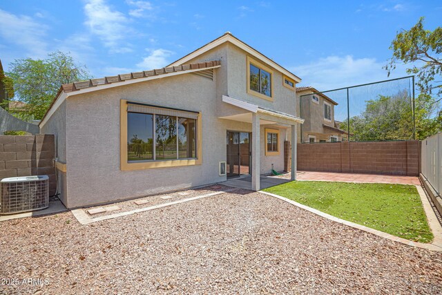 1236 S Boulder St Unit C, Gilbert, AZ 85296 - back of property with a fenced backyard, a patio area, and stucco siding