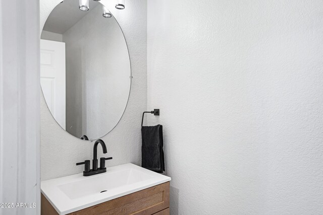 1236 S Boulder St Unit C, Gilbert, AZ 85296 - bathroom with vanity and a textured wall