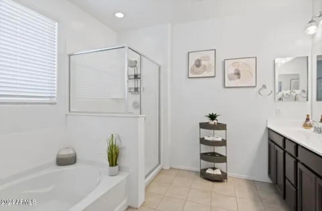 bathroom featuring vanity, separate shower and tub, and tile patterned flooring