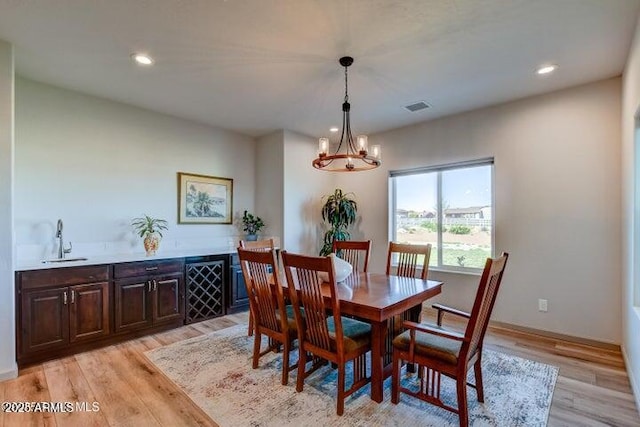 130 Brenna Dr, Chino Valley, AZ 86323 - dining space with a chandelier, light wood-type flooring, and recessed lighting