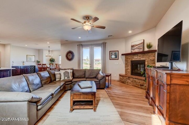 130 Brenna Dr, Chino Valley, AZ 86323 - living area featuring a fireplace, a ceiling fan, recessed lighting, and light wood-style floors