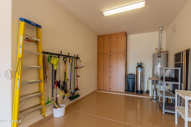 garage featuring gas water heater