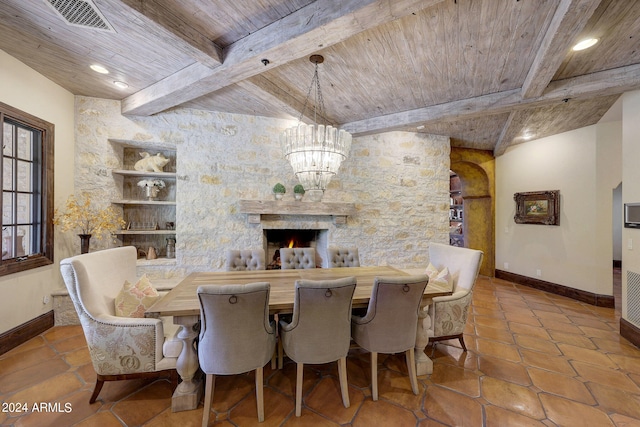 tiled dining space featuring beam ceiling, a chandelier, and wood ceiling