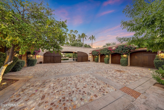 view of front of home featuring a patio