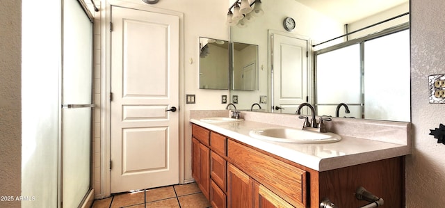 bathroom with tile patterned flooring and vanity