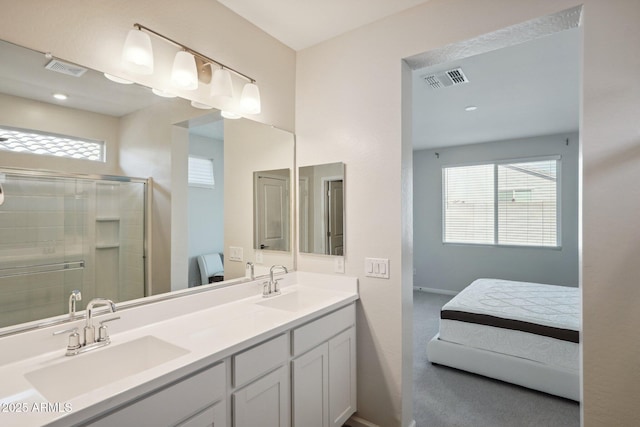 bathroom featuring walk in shower and vanity