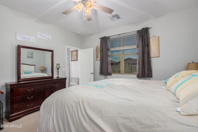 carpeted bedroom featuring ceiling fan