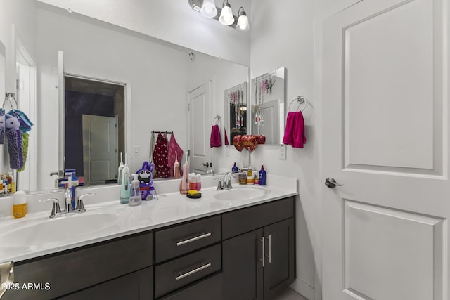 full bath featuring a sink and double vanity