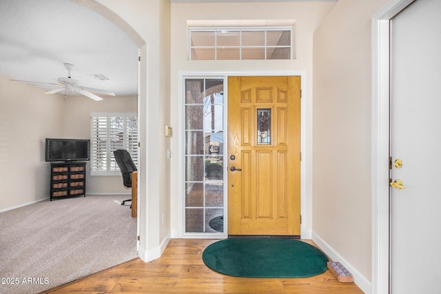 foyer featuring hardwood / wood-style floors and ceiling fan