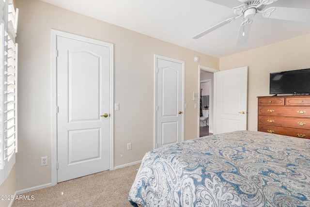 bedroom with light carpet and ceiling fan