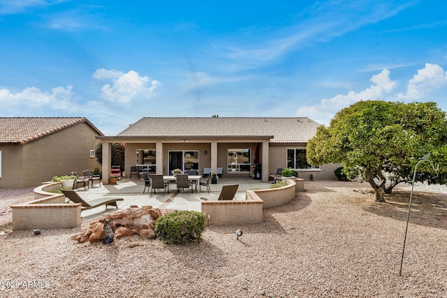 back of house with a patio area