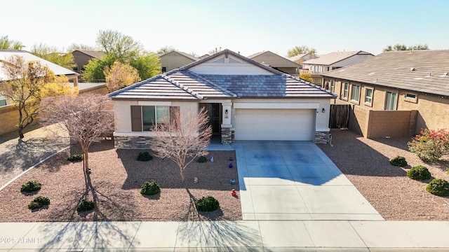 ranch-style home featuring a garage