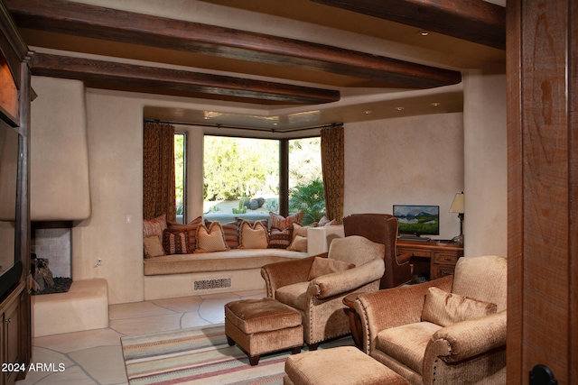 interior space featuring beamed ceiling