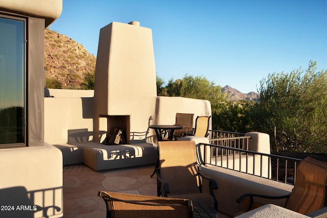 view of patio / terrace with a mountain view