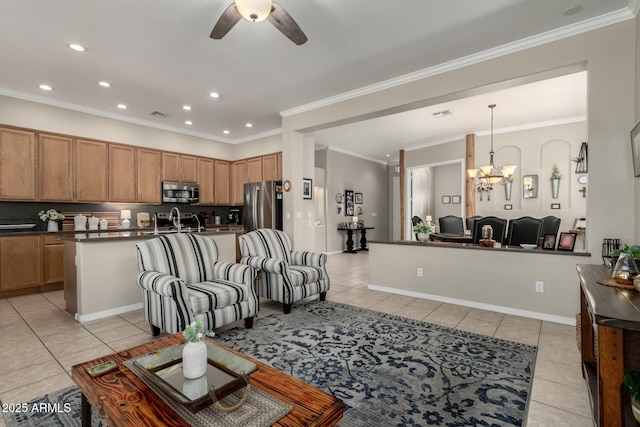 tiled living room featuring ceiling fan with notable chandelier and ornamental molding