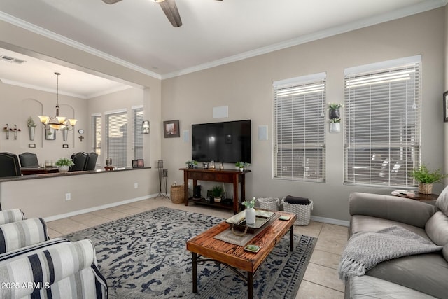 tiled living room with crown molding and ceiling fan with notable chandelier