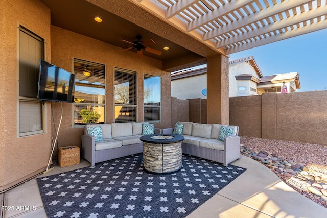 view of patio with a pergola and an outdoor living space with a fire pit