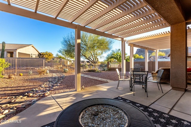 view of patio / terrace featuring an outdoor fire pit and a pergola