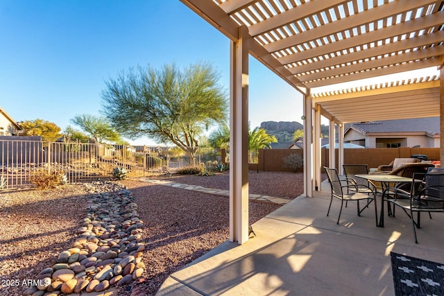 view of patio featuring a pergola