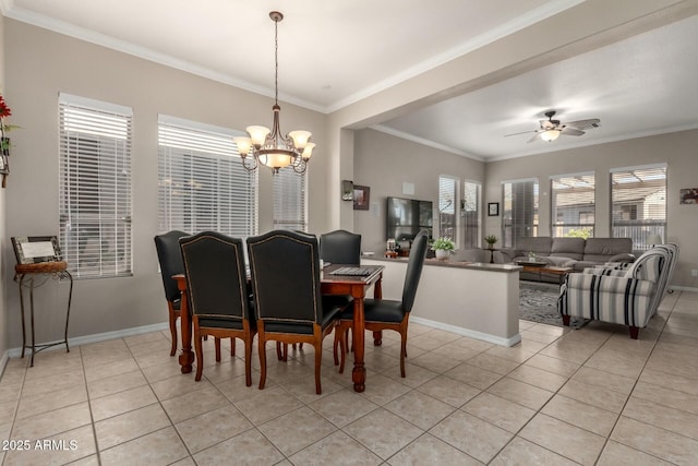 tiled dining room with crown molding and ceiling fan with notable chandelier