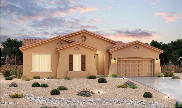 19949 W Mulberry Dr, Buckeye, AZ 85396 - mediterranean / spanish house featuring driveway, stucco siding, an attached garage, and a tiled roof